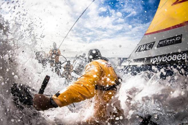Onboard Abu Dhabi Ocean Racing - Simon SiFi Fisher turns away from another wave as he adjusts the traveller in the Southern Ocean - Leg five to Itajai -  Volvo Ocean Race 2015 © Matt Knighton/Abu Dhabi Ocean Racing